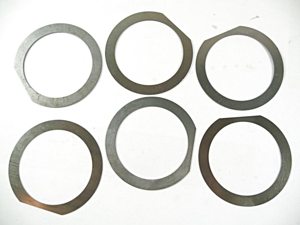 Shimsbricka oljepump mellanaxel