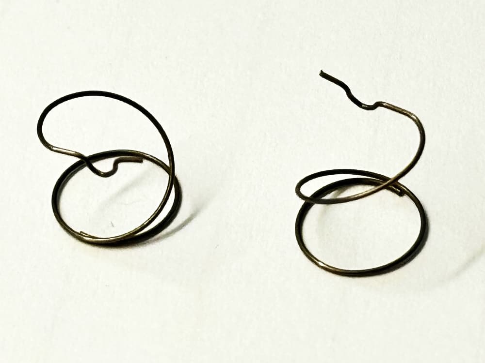 Huvudmunstycke fjäder