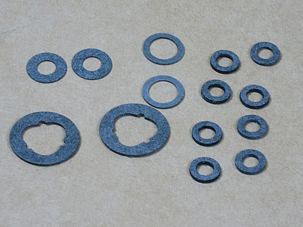 Packning flottörhuslock