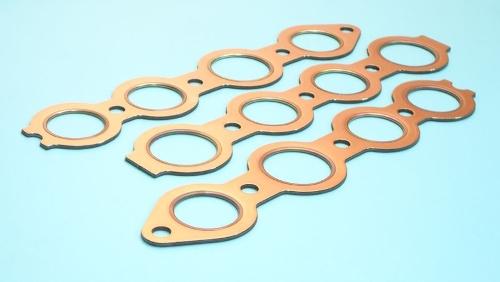 Packning kombination av insugs- och grenrör